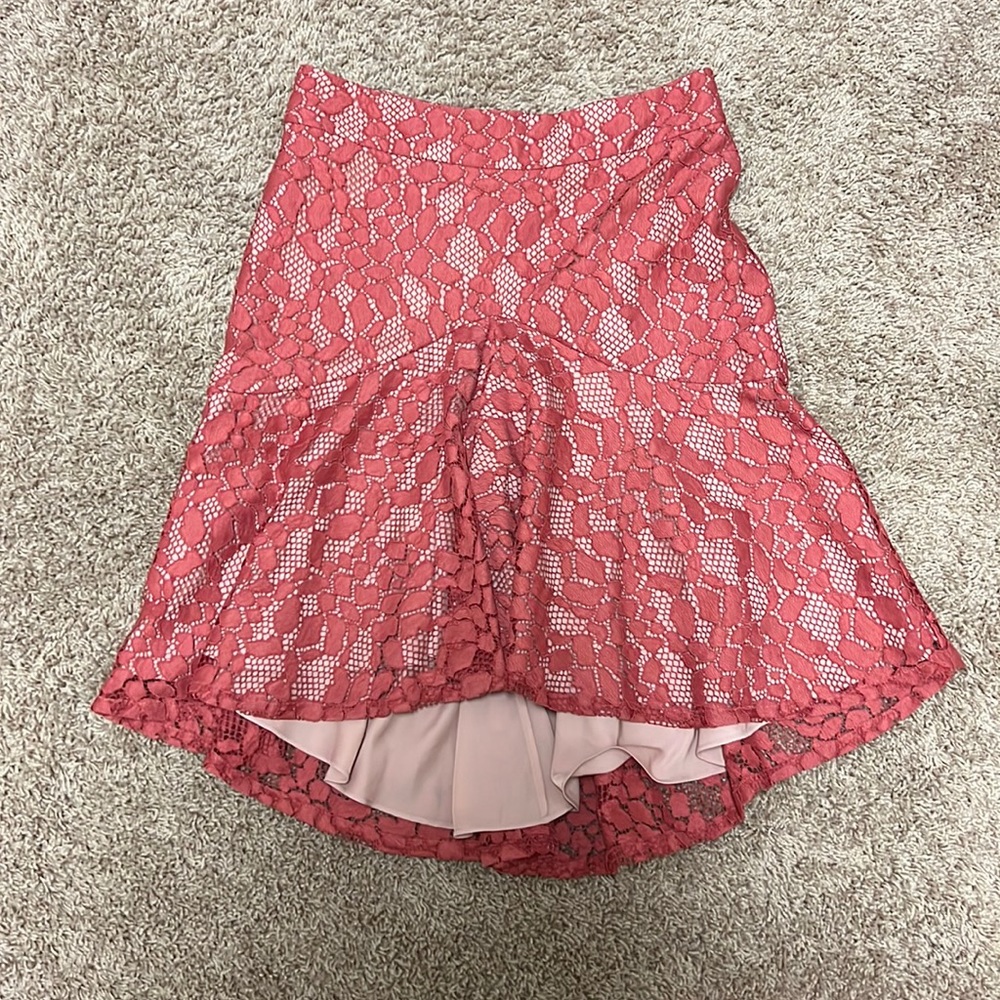 Alexis skirt with lace overlay . Shorter in front then back